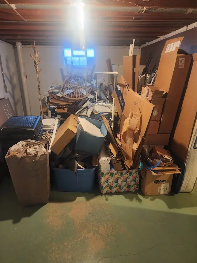 Roll-off dumpster container at job site for 2 Yard Dumpster Rental in Allendale